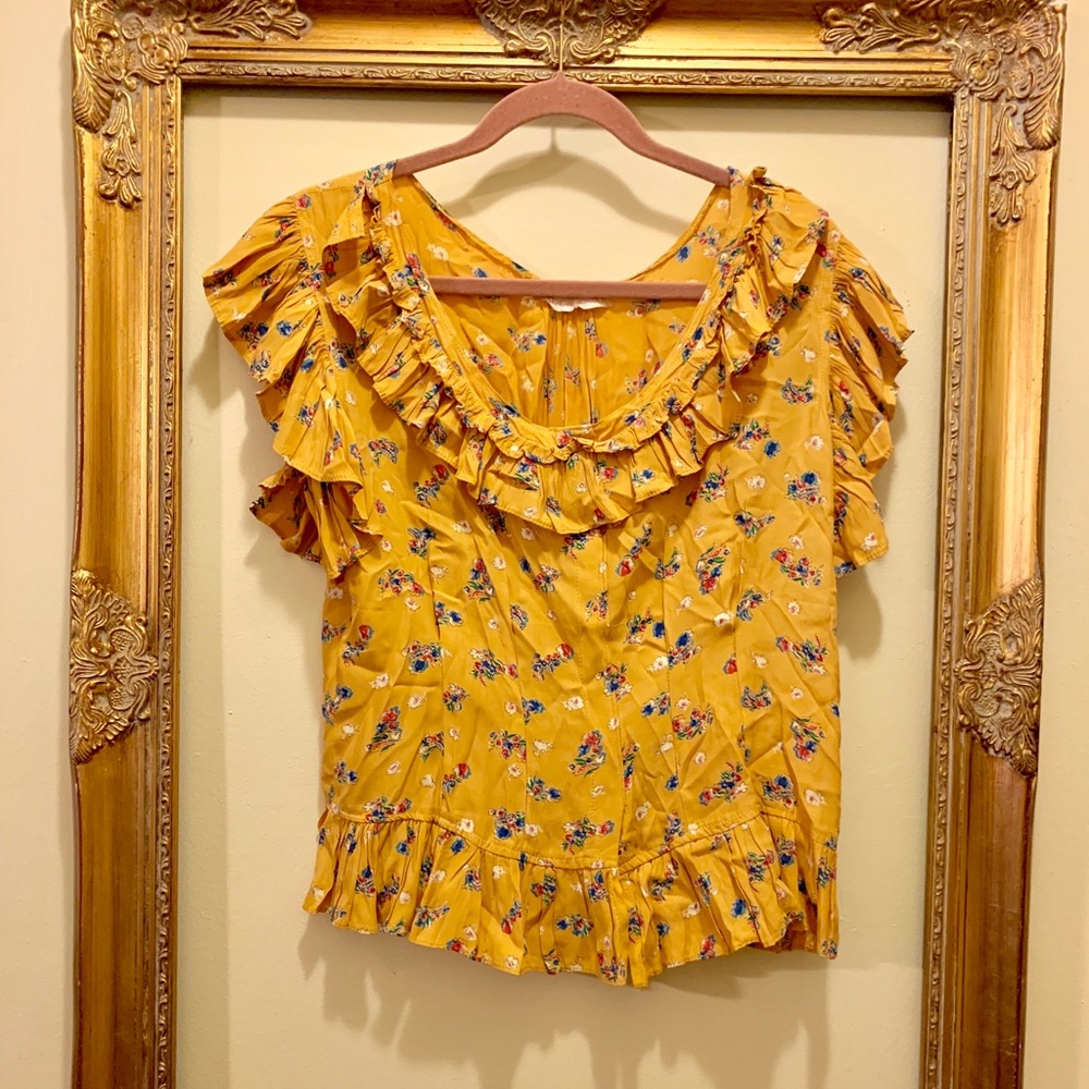 mustard blouse with ruffles and floral print